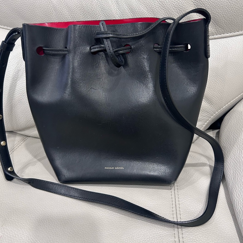 Mansur Gavriel Black Leather Drawstring Bucket Bag with Red Interior